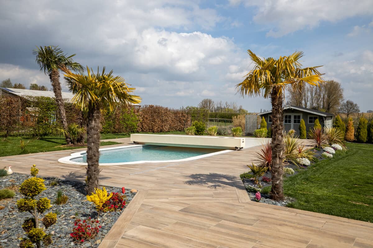 Couverture de piscine de luxe automatique avec un décor de Palmier